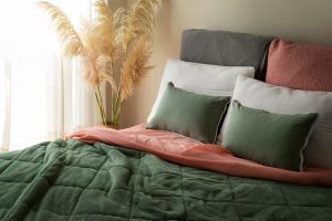 high-angle-cozy-bed-arrangement_23-2150326156